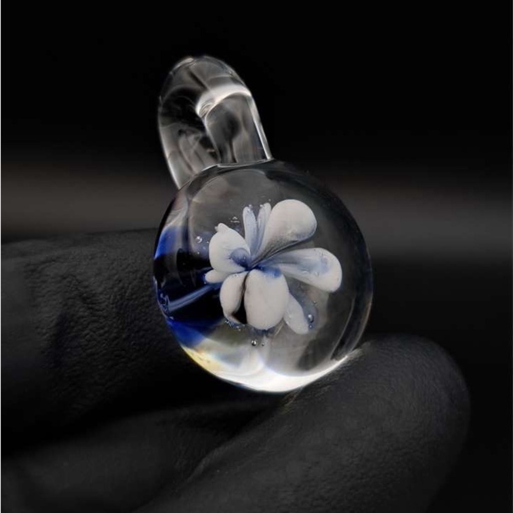 Hand Blown Glass Pendant with Blue and White Flower Uv reactive